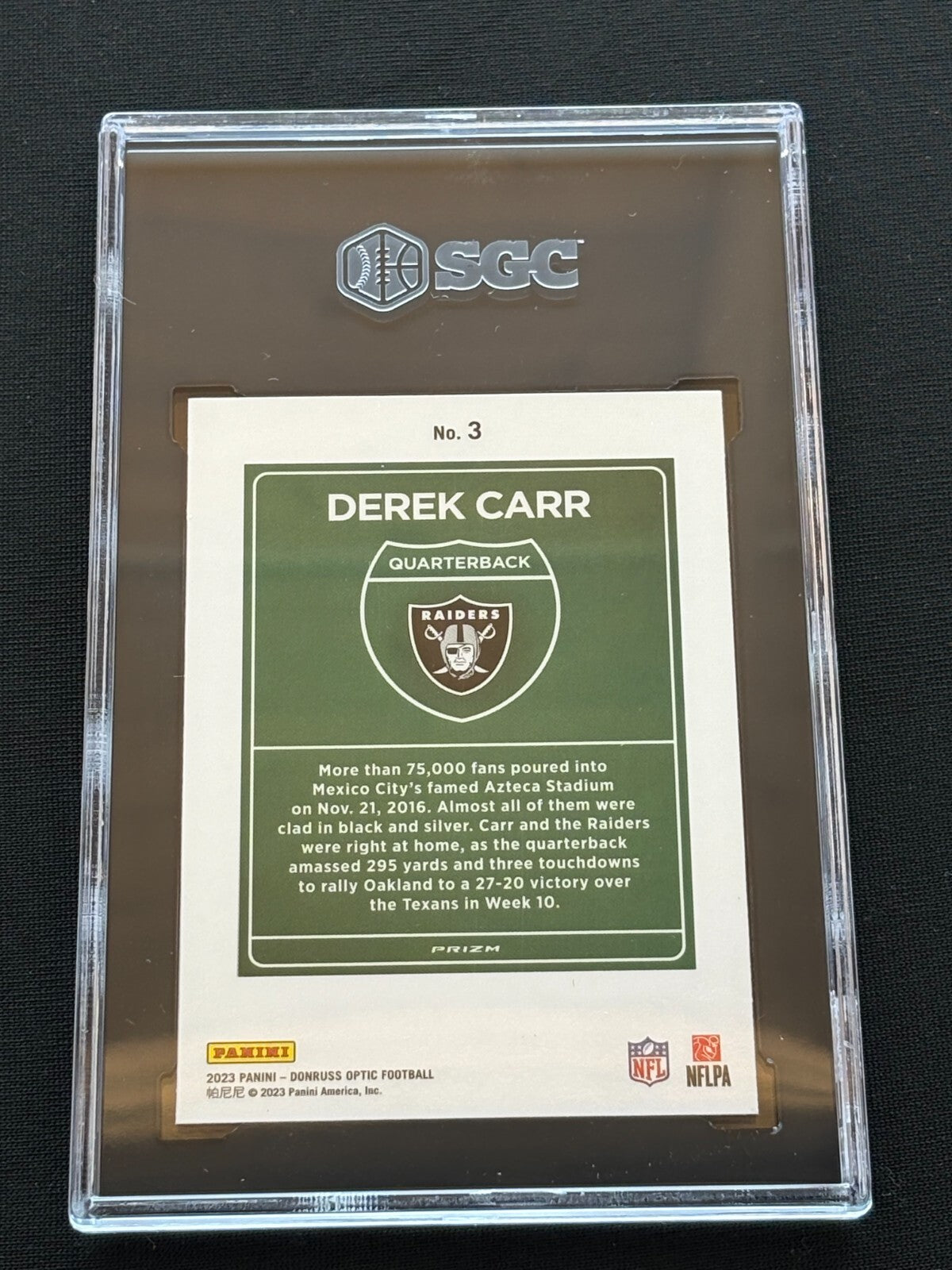 Derek Carr 2023 Optic International Downtown CASE HIT SSP Raiders SGC 8.5
